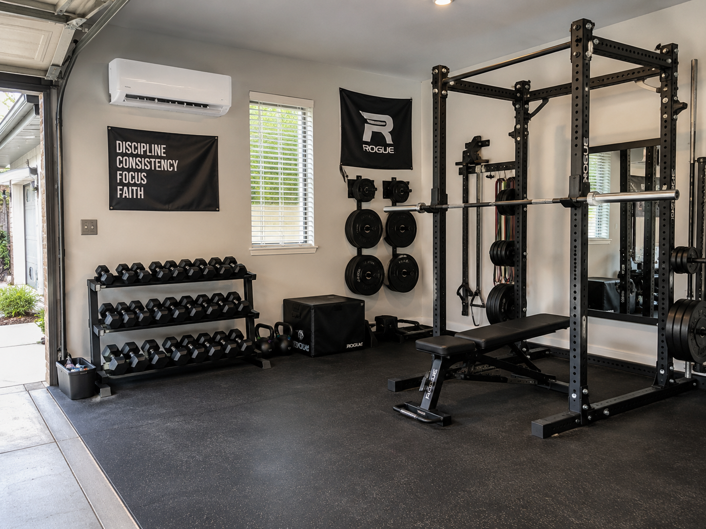 Home gym setup in a climate-controlled South Florida garage